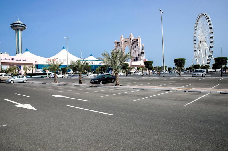 Abu Dhabi, United Arab Emirates, March 27, 2020.   The nearly empty parking lot at the Marina Mall on the first day of the UAE cleaning campaignEmiratis and residents across the UAE must stay home this weekend while a nationwide cleaning and sterilisation drive is carried out. 
Victor Besa / The National