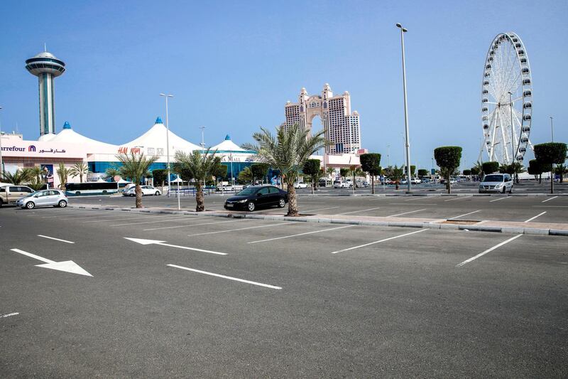 Abu Dhabi, United Arab Emirates, March 27, 2020.   The nearly empty parking lot at the Marina Mall on the first day of the UAE cleaning campaignEmiratis and residents across the UAE must stay home this weekend while a nationwide cleaning and sterilisation drive is carried out. 
Victor Besa / The National