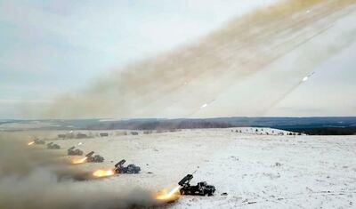 Russian rocket launchers fire during military drills near Orenburg in the Urals, Russia, on December 16, 2021. AP