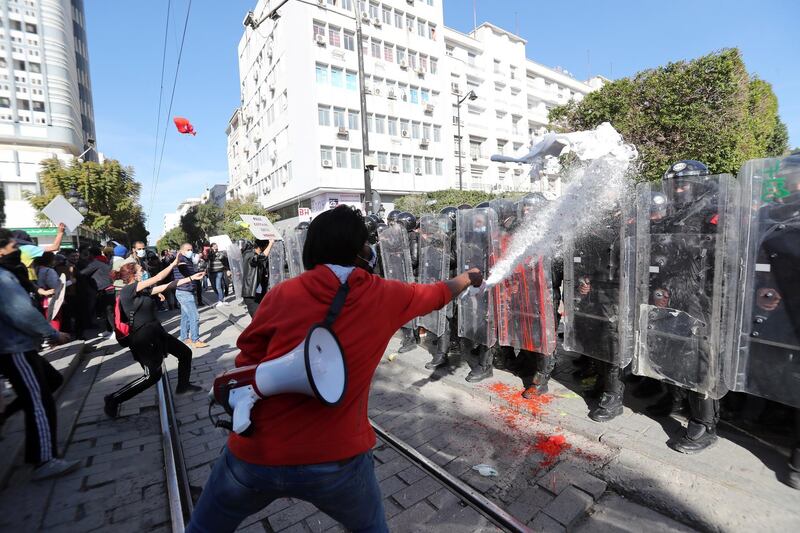 Tunisian protesters clash with anti-riot policemen during a demonstration in Tunis. EPA