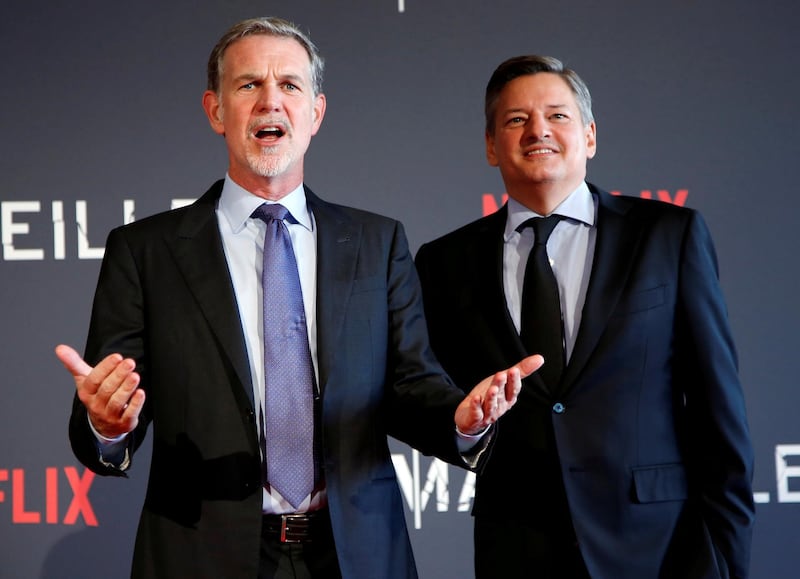 FILE PHOTO: Reed Hastings, co-founder and CEO of Netflix (L), and Netflix chief content officer Ted Sarandos pose on the red carpet at the French premiere of Netflix's TV series "Marseille" in Marseille, France, May 4, 2016. REUTERS/Jean-Paul Pelissier/File Photo