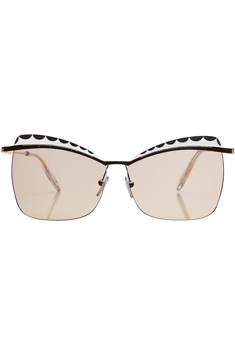 Alexander McQueen sunglasses, Dh1,537 at Stylebop.com.