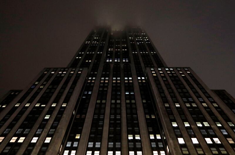 The Empire State Building stands unlit to mark Earth Hour in New York. EPA 