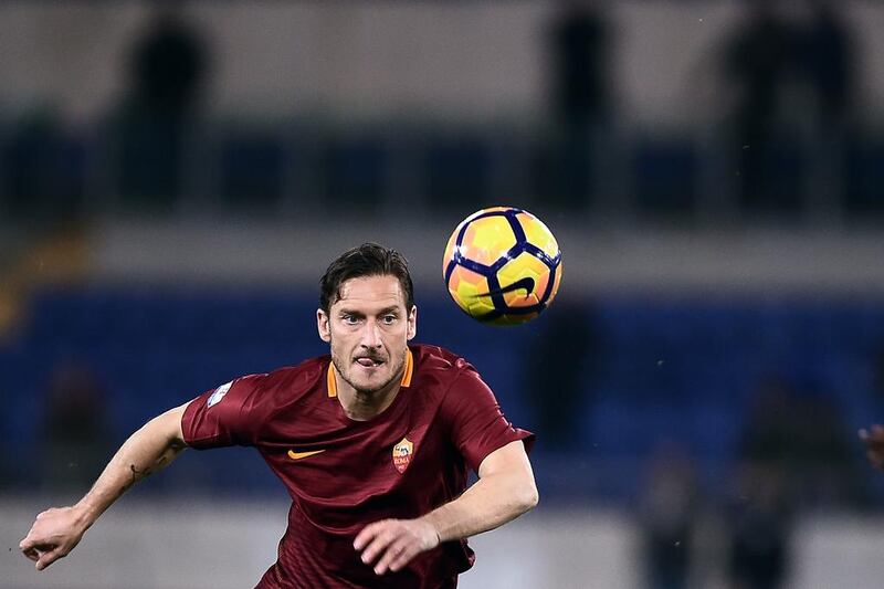 Roma forward Francesco Totti controls the ball during the Italian TIM Cup first-leg semifinal football match on March 1, 2017 at the Olympic stadium in Rome. Filippo Monteforte / AFP