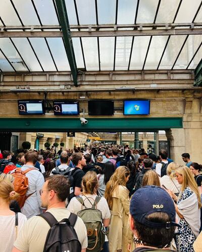 Eurostar passengers queue at Gare du Nord station in Paris on Sunday. PA