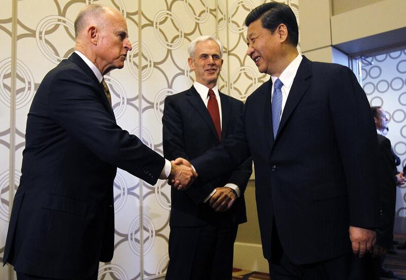 The Chinese vice president Xi Jinping meets the California governor Jerry Brown, left, and the US commerce secretary John Bryson. Robert Gauthier / AFP