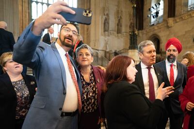 Afzal Khan with Labour colleague Ashley Dalton as she was welcomed to the Houses of Parliament. PA