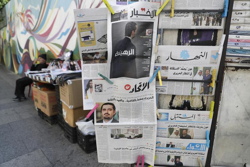 A picture shows front pages of newspapers featuring Lebanese Prime Minister Saad Hariri following his resignation, on November 6, 2017, in the capital Beirut.
Hariri announced his resignation on November 4, 2017, citing Iran's "grip" on the country and threats to his life. / AFP PHOTO / JOSEPH EID