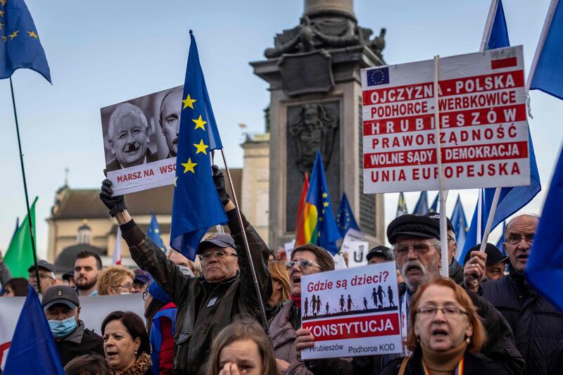 Demonstrators show their support for Poland's membership of the EU in front of the Royal Castle in Warsaw on Saturday. AFP