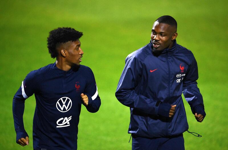 France's Kingsley Coma, left, and Marcus Thuram. AFP