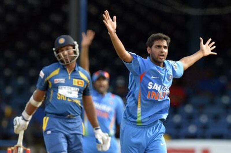 Bhuvneshwar Kumar took a career-best four for eight against Sri Lanka. Jewel Samad / AFP