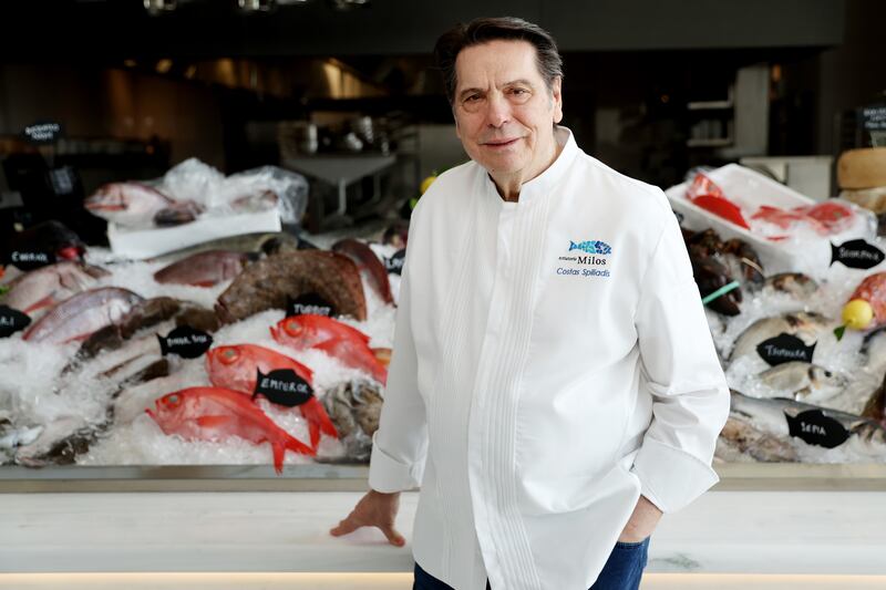 Chef Costas Spiliadis at the live food counter at Greek restaurant Estiatorio Milos at Atlantis The Royal. Getty Images