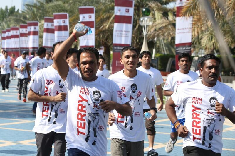 People take part in the Terry Fox run on along Abu Dhabi Corniche. Delores Johnson / The National