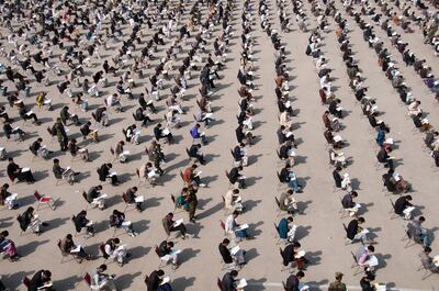 HEX6WJ 101104-F-1020B-013.jpg Kabul - More than 4,560 candidates take a test to compete for 600 available National Military Academy of Afghanistan slots in the class of 2015 at the academy in Kabul Nov. 4, 2010. The academy issued invitations to the top three percent of recent high school graduates to attend a three-day selection process which consists of a physical fitness and written exam. (U.S. Air Force photo by Staff Sgt. Sarah Brown/RELEASED) Flickr - DVIDSHUB - Thousands compete for Afghan military academy (Image 1 of 9). Alamy