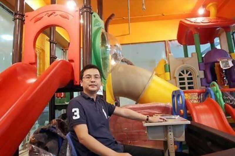 Shen Jian is one of hundreds of Chinese nationals who have launched small and medium sized enterprises in the Emirates in recent years. Satish Kumar / The National