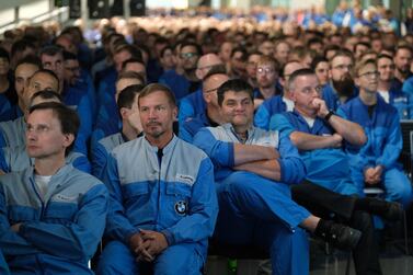 BMW workers listen as German President Frank-Walter Steinmeier speaks to them at the BMW factory. Harald Krueger became chief executive of the German carmaker in May 2015. Getty