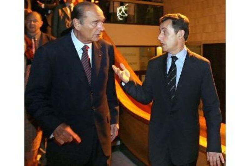 Jacques Chirac, left, with Nicolas Sarkozy, was 'very hurt' when Sarkozy failed to mention his predecessor in his victory speech. Patrick Kovarik, pool / AP Photo