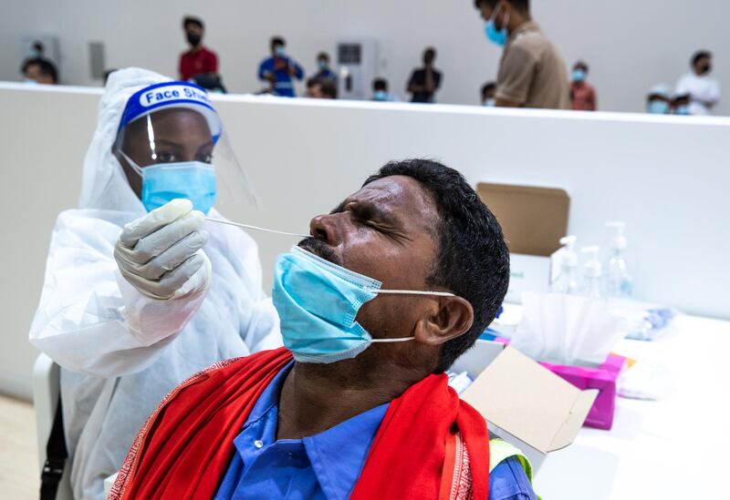 Residents and workers are a big show for PCR free tests at the  SEHA Covid-19 Drive-Through Service Center at 6th Street, Musaffah in Abu Dhabi on June 17th, 2021.  There is a huge demand for vaccinations and PCRs after the green pass restrictions. Victor Besa / The National.
Reporter: Shireena Al Nowais for News