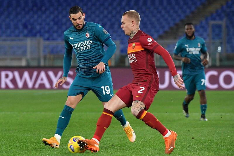 Roma's Dutch defender Rick Karsdorp defends against AC Milan's French defender Theo Hernandez. AFP