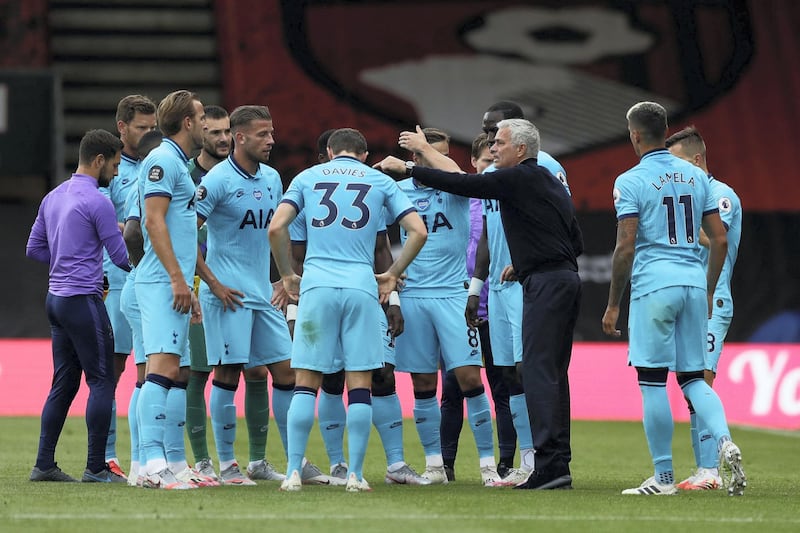 Tottenham Hotspur's Portuguese head coach Jose Mourinho (2nd R) speaks to his players  during the English Premier League football match between Bournemouth and Tottenham Hotspur at the Vitality Stadium in Bournemouth, southern England, on July 9, 2020. (Photo by Matt Dunham / POOL / AFP) / RESTRICTED TO EDITORIAL USE. No use with unauthorized audio, video, data, fixture lists, club/league logos or 'live' services. Online in-match use limited to 120 images. An additional 40 images may be used in extra time. No video emulation. Social media in-match use limited to 120 images. An additional 40 images may be used in extra time. No use in betting publications, games or single club/league/player publications. / 