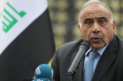 (FILES) In this file photo taken on October 23, 2019, Iraq's Prime Minister Adel Abdel Mahdi speaks during a symbolic funeral ceremony in Baghdad for a commander of the Iraqi Federal Police's Fourth Division, who was killed in Samarra, north of the Iraqi capital. As anti-government protests sweep his country since the begining of October 2019, Iraq's embattled premier has found his decision-making powers clipped by rivals and his entourage subject to increasing pressure from Iran, Iraqi officials told AFP. Adel Abdel Mahdi, 77, came to power last year as the product of a tenuous alliance between populist cleric Moqtada Sadr and pro-Iran paramilitary chief Hadi al-Ameri, with the required blessing of the country's top Shiite religious authority. / AFP / AHMAD AL-RUBAYE
