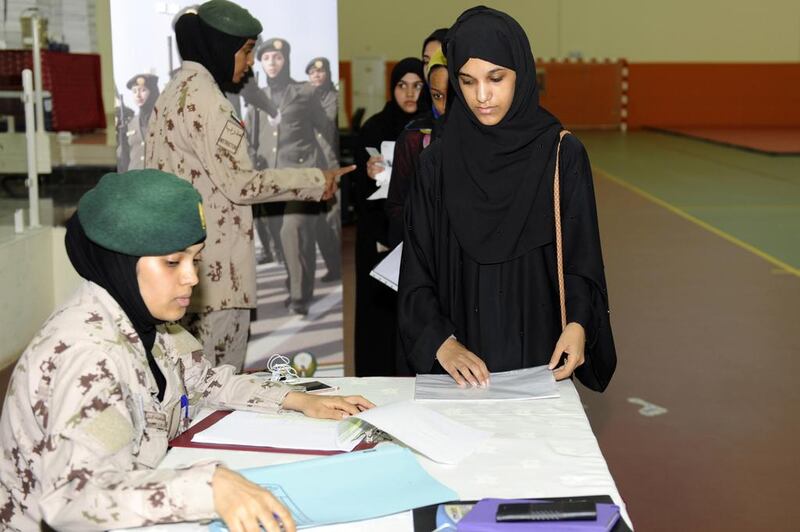 Volunteers register for National Service at Khawla bint Al Azwar Military School. Wam