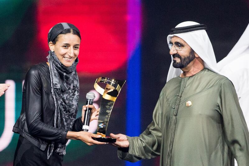 DUBAI, UNITED ARAB EMIRATES, 18 MAY  2017. 

Sheikh Mohammed bin Rashid, Vice President and Ruler of Dubai , awards Nawal Al Soufi at The Arab Hope Makers awards ceremony at Dubai Studio City.

The initiative, launched on March 1, gathered more than 65,000 nominations in the first month alone. The aim is to honour and reward those who have inspired others to social prosperity in various fields, especially those who do so with their own funding or with limited resources.

Nominations revealed the stories of individuals who profoundly improve the lives of others in their communities, organisers said. They also show the dire challenges that many in the Arab world face, as well as the commitment and humanitarian spirit of those who generously give time and effort to overcome these obstacles and spread hope.


Photo: Reem Mohammed / The National (Section: NA)  *** Local Caption ***  RM_20170518_HOPE_005.JPG