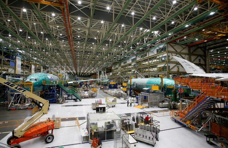 FILE PHOTO: Several Boeing 777X aircraft are seen in various stages of production during a media tour of the Boeing 777X at the Boeing production facility in Everett, Washington, U.S., February 27, 2019. Picture taken February 27, 2019. REUTERS/Lindsey Wasson/File Photo