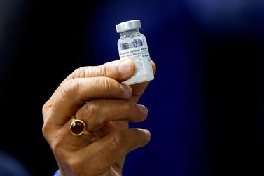 Indian Health Minister Harsh Vardhan holds a dose of Bharat Biotech’s Covid-19 vaccine, Covaxin, at All India Institute of Medical Sciences, New Delhi, on January 16, 2021. Reuters