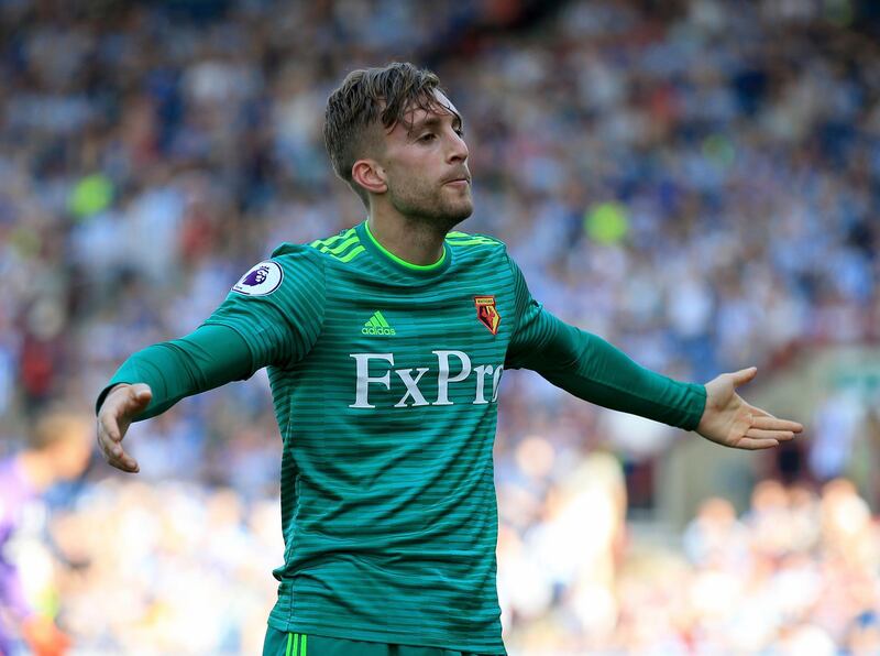 Watford's Gerard Deulofeu celebrates after he scores his sides second goal during the English Premier League soccer match between Huddersfield and Watford at the John Smithâ€™s stadium, Huddersfield, England. Saturday, April 20, 2019. (Clint Hughes/PA via AP)