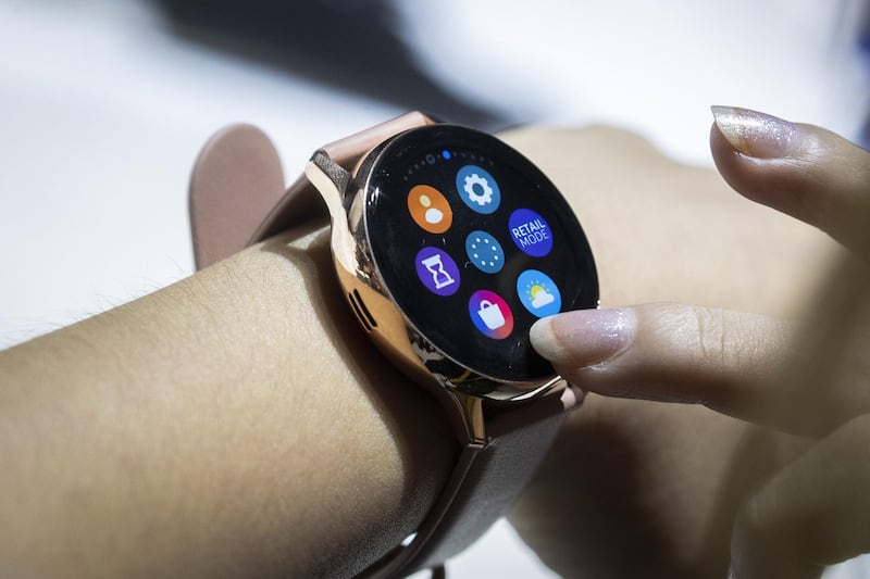 A woman tries out the new Samsung Galaxy Watch Active 2. AFP