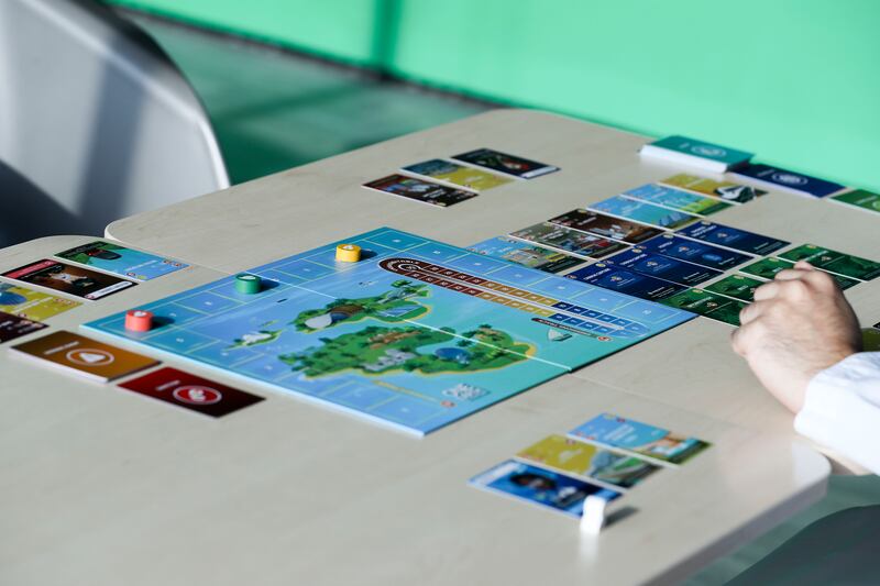 One Earth board game created by Mohamed Al Qadi about global warming. Khushnum Bhandari / The National

