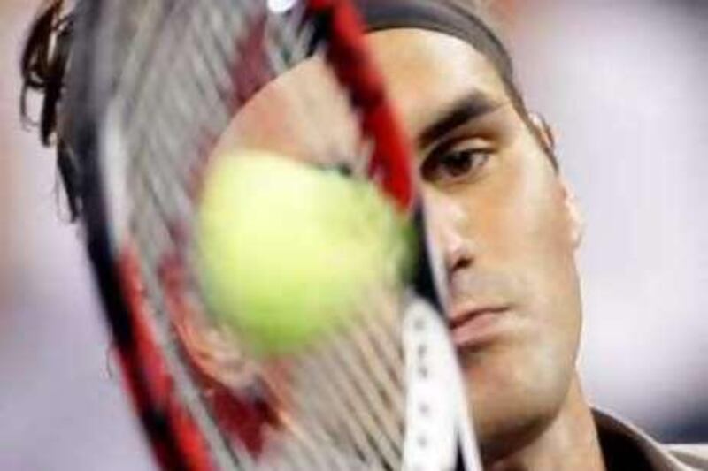 Roger Federer, of Switzerland, returns to Maximo Gonzalez, of Argentina, during a match at the U.S. Open tennis tournament in New York, Tuesday, Aug. 26, 2008. (AP Photo/Ed Betz) *** Local Caption ***  NYEB112_US_Open_Tennis.jpg