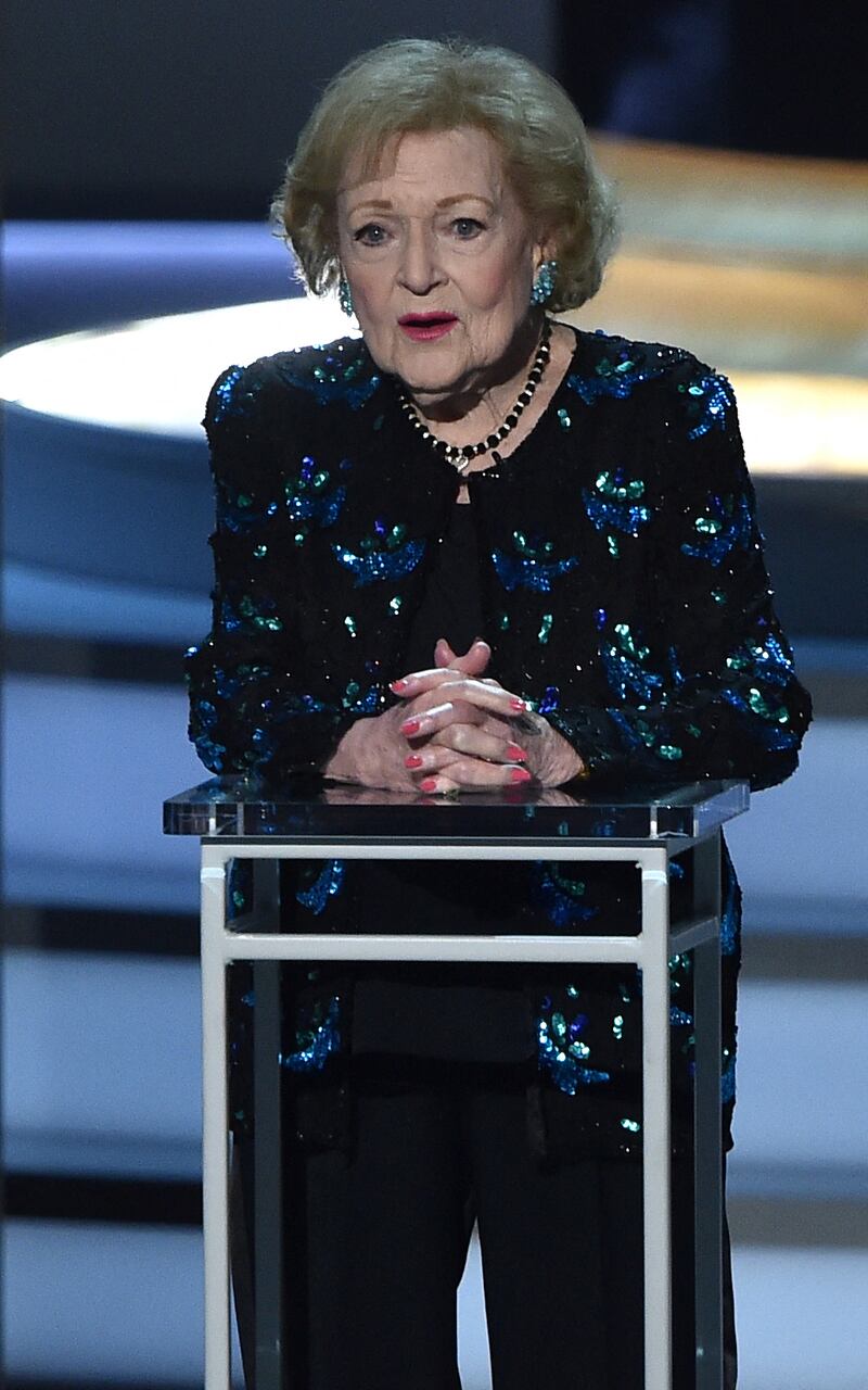 Betty White, wearing a repeated black and green floral sequinned jacket, onstage during the 70th Emmy Awards at the Microsoft Theatre in Los Angeles, California, on September 17, 2018. AFP