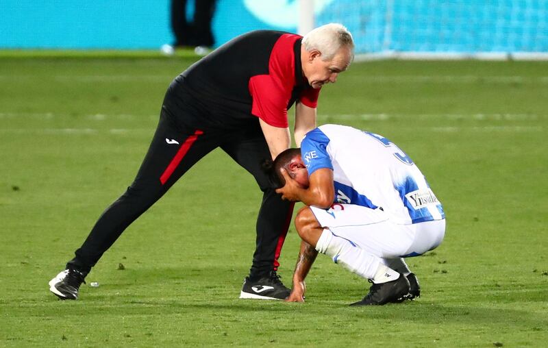 Leganes coach Javier Aguirre consoles Jonathan Silva. Reuters