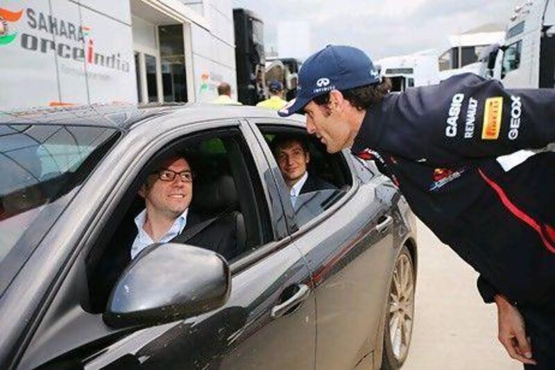 Mark Webber, right, held talks with Ferrari's Stefano Domenicali, left. Mark Thompson / Getty Images