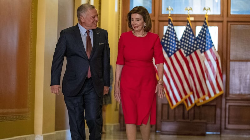 King Abdullah chats with US House Speaker Nancy Pelosi during a meeting at the Capitol in Washington. Getty Images / AFP

