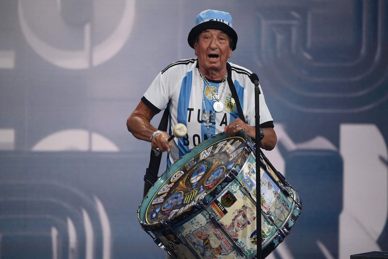 Argentina supporter El Tula delivers a speech as he received for Argentina supporters the Best Fifa Fan Award. AFP