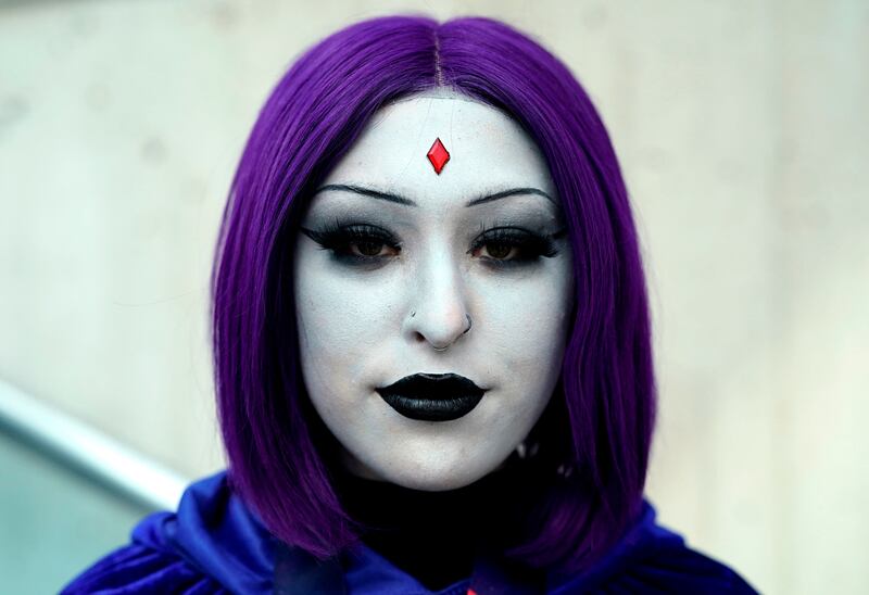 A cosplayer attends the first day of the New York Comic Con. Timothy A Clary / AFP