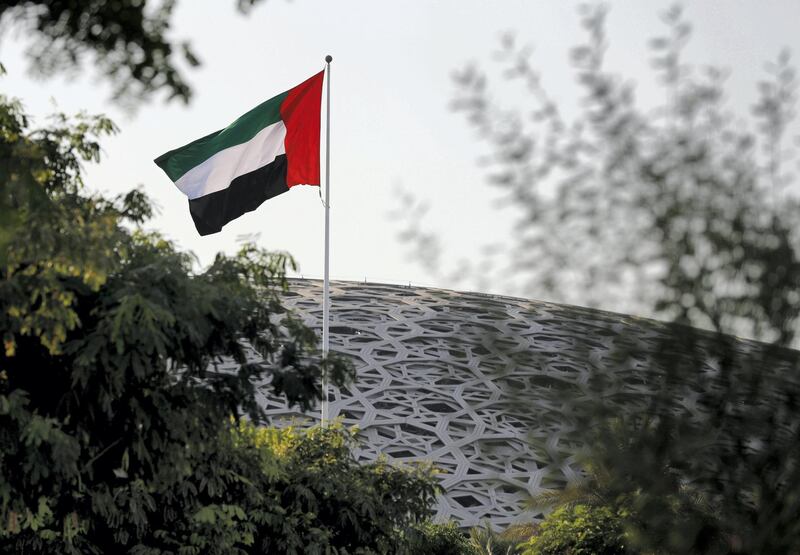 Abu Dhabi, United Arab Emirates, September 17, 2020.  The U.A.E. flag proudly waves at the Louvre Abu Dhabi on a Thursday afternoon.  Victor Besa/The National.
Section: Standalone

