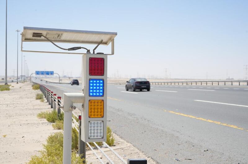 Abu Dhabi Police's new system uses coloured lights to alert drivers to hazards and adverse weather conditions. Photo: Abu Dhabi Police