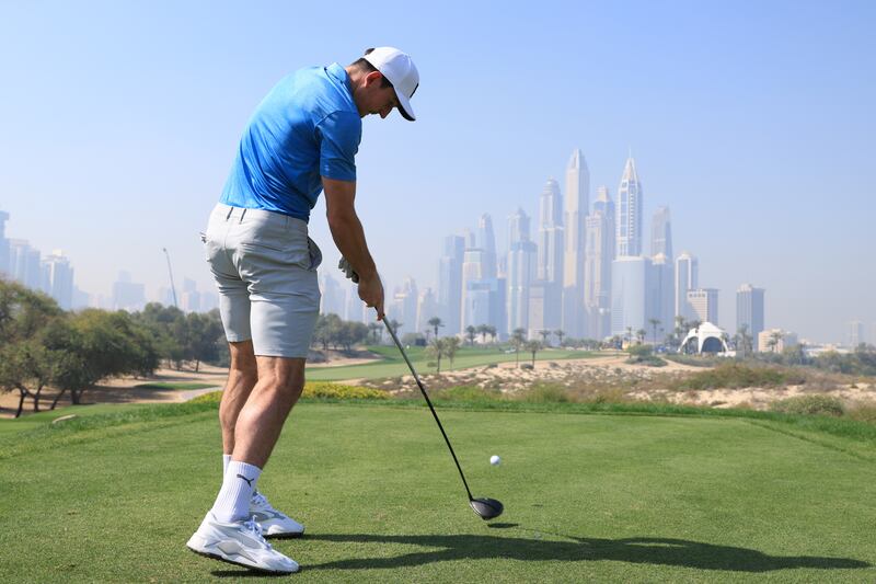 Harry Maguire of Manchester United tees off on the 8th hole during a pro-am round prior to the Slync.io Dubai Desert Classic at Emirates Golf Club on January 26, 2022 in Dubai. Getty Images