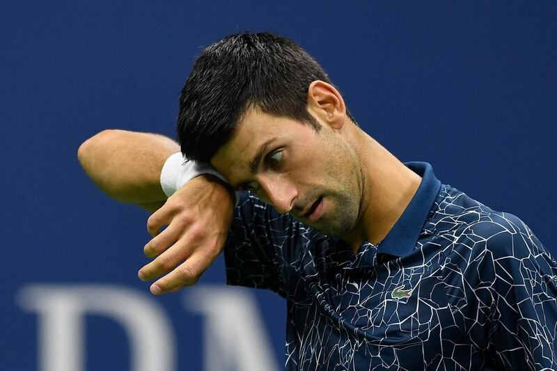 NEW YORK, NY - SEPTEMBER 09: Novak Djokovic of Serbia reacts during his men's Singles finals match against Juan Martin del Potro of Argentina on Day Fourteen of the 2018 US Open at the USTA Billie Jean King National Tennis Center on September 9, 2018 in the Flushing neighborhood of the Queens borough of New York City.   Sarah Stier/Getty Images/AFP
== FOR NEWSPAPERS, INTERNET, TELCOS & TELEVISION USE ONLY ==
