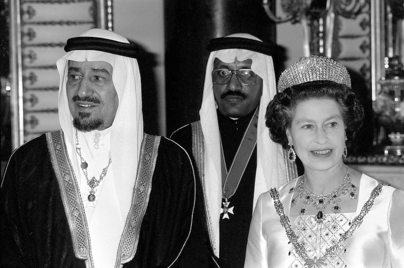 Queen Elizabeth II and King Khalid of Saudi Arabia at a State banquet at Buckingham Palace.