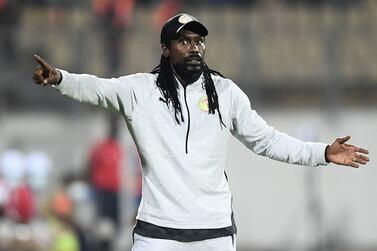 Senegal's head coach Aliou Cisse gestures during the Africa Cup of Nations (CAN) 2021 semi final football match between Burkina Faso and Senegal at Stade Ahmadou-Ahidjo in Yaounde on February 2, 2022.  (Photo by CHARLY TRIBALLEAU  /  AFP)