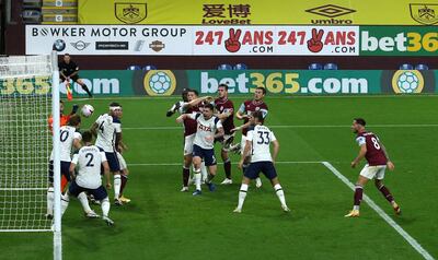 Burnley's James Tarkowski sees his header cleared off the line by Tottenham Hotspur's Harry Kane (left) during the Premier League match at Turf Moor, Burnley. PA Photo. Picture date: Monday October 26, 2020. See PA story SOCCER Burnley. Photo credit should read: Jason Cairnduff/PA Wire. RESTRICTIONS: EDITORIAL USE ONLY No use with unauthorised audio, video, data, fixture lists, club/league logos or "live" services. Online in-match use limited to 120 images, no video emulation. No use in betting, games or single club/league/player publications.