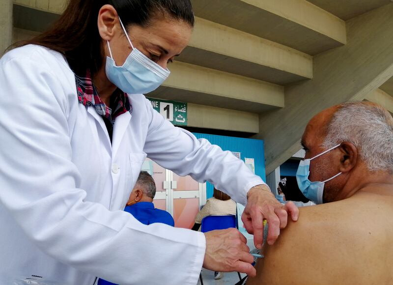 A man is vaccinated against Covid-19 in Tunis.