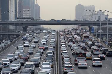 Beijing's central business area. A slowing Chinese car market crimped Panasonic profits. Reuters