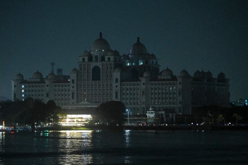 The Telangana State Secretariat building is pictured with its lights switched off during the Earth Hour environmental campaign in Hyderabad. AFP