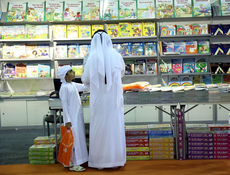 Sharjah, 03, Nov, 2017: Visitors take a look at the books during the Sharjah International Book Fair at the Sharjah Expo Centre in Sharjah. Satish Kumar for the National / Story by Saeed Saeed